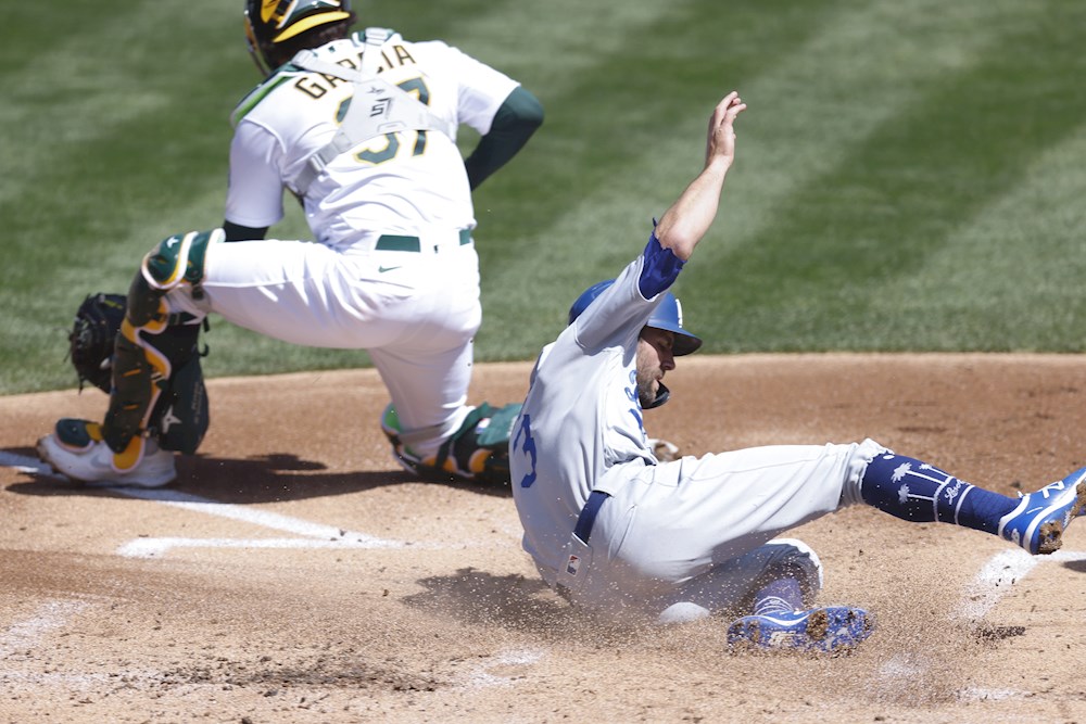 Taylor jonronea dos veces contra los Rockies