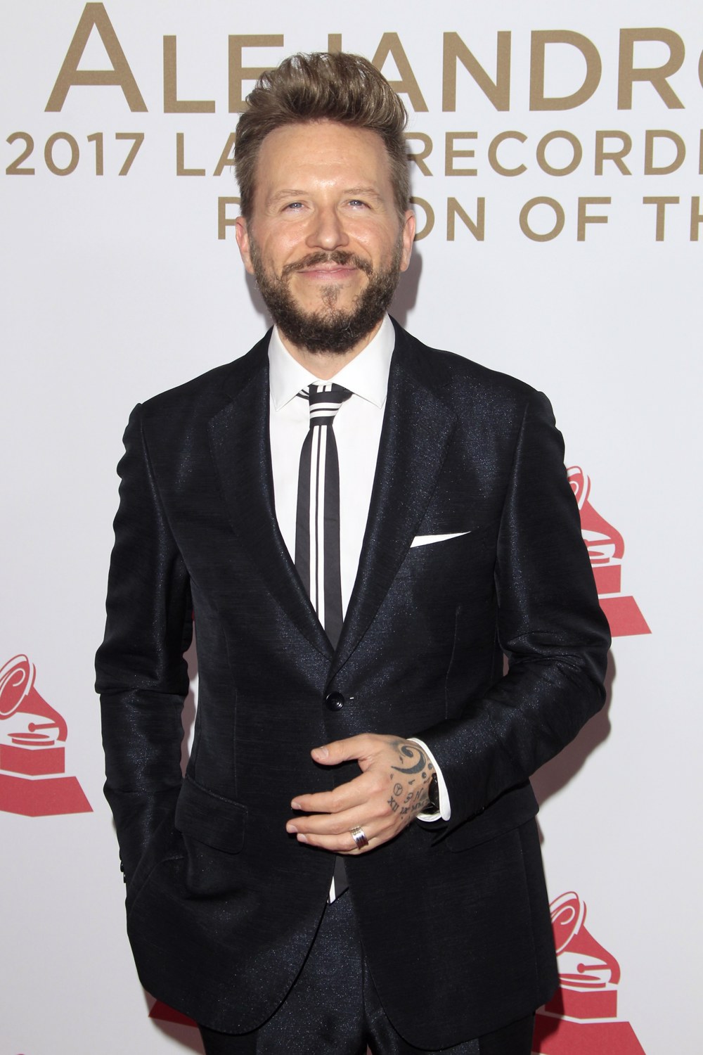 La canción del año “Leave The Door Open” tendrá una versión salsa