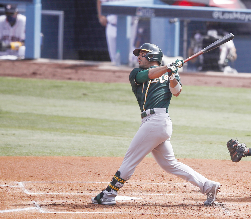 7-8. El dominicano Ramón Laureano, clave en el triunfo de los Atléticos sobre los Angelinos
